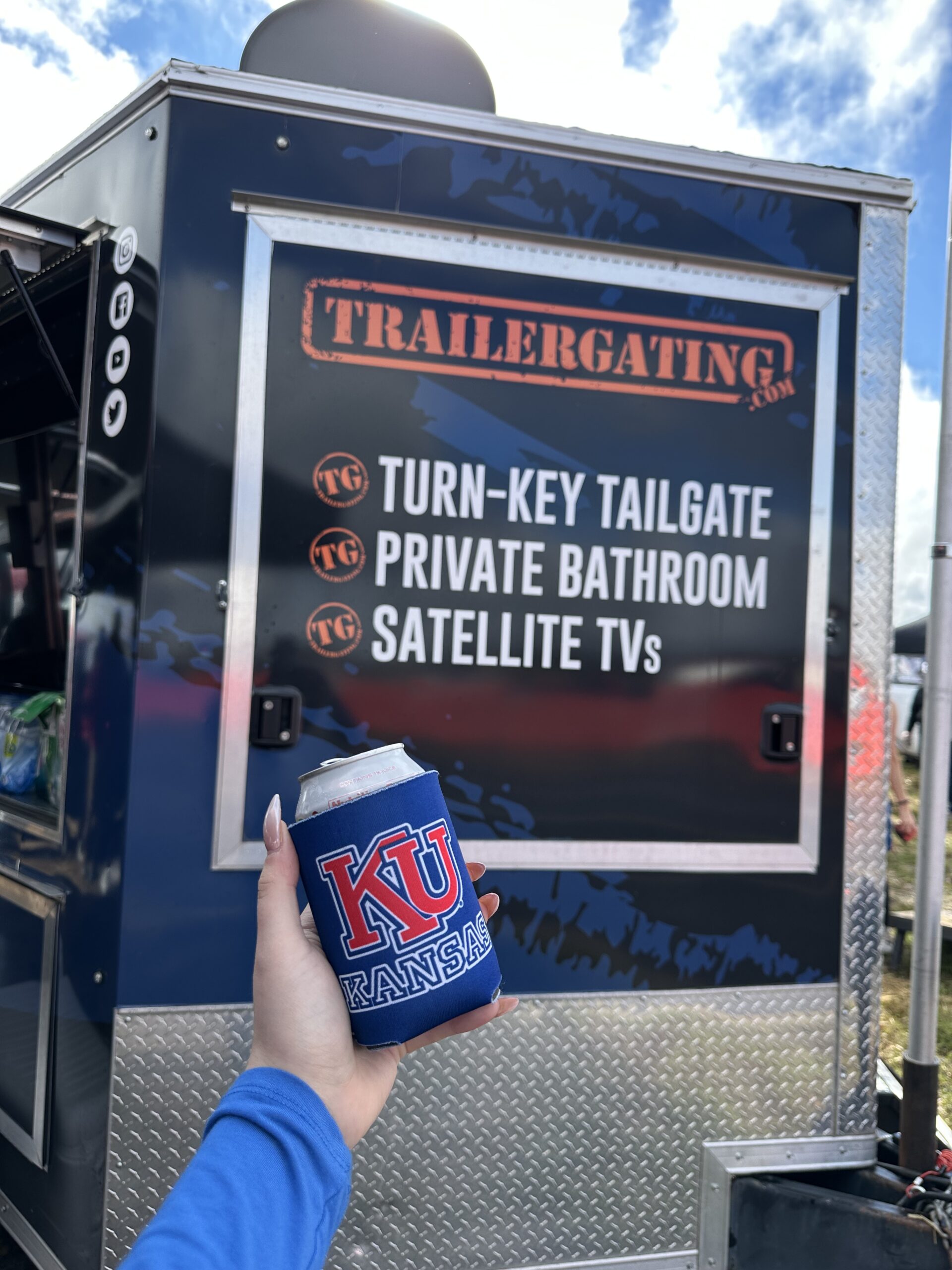 KU Coozie in front of TG